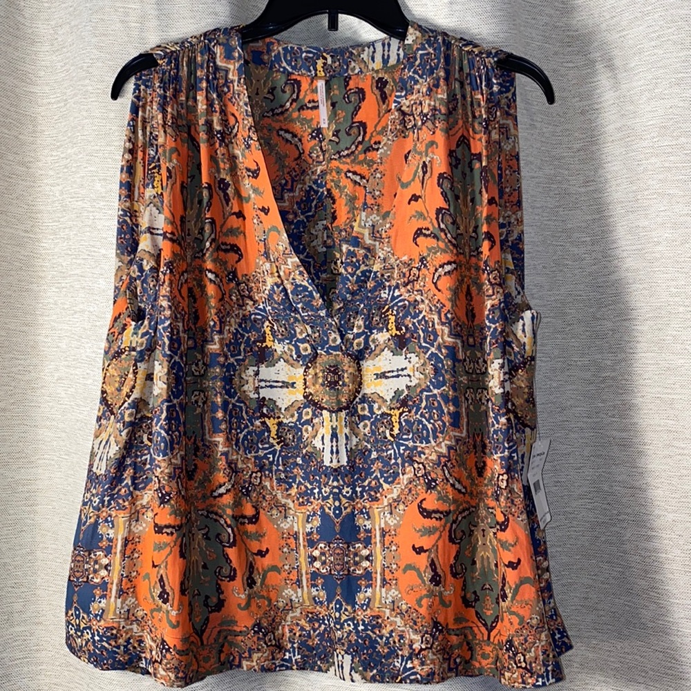 Free People, NWT women’s orange/multi sleeveless boho v-neck blouse. Size medium